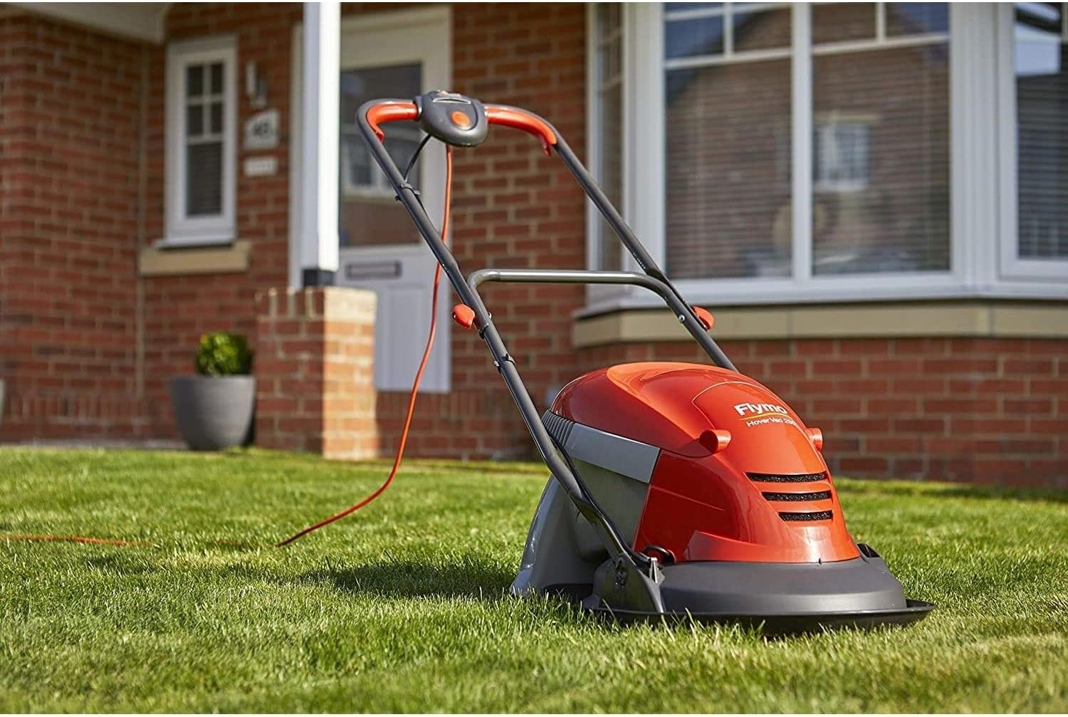 Flymo Hover Vac 250 Electric Hover Collect Lawn Mower - 1400W, 25cm Cutting Width, 15L Grass Box, Ambidextrous Handles, Folds Flat, Orange and Grey