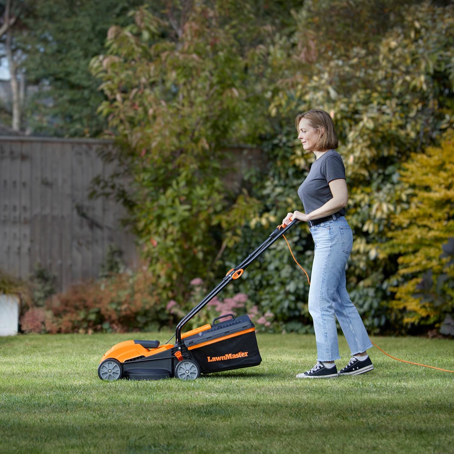 LawnMaster 1200W Electric Lawn Mower with 32cm cutting width, ideal for small lawns. With 5 adjustable cutting heights and rear roller for striped finish, 2 year guarantee