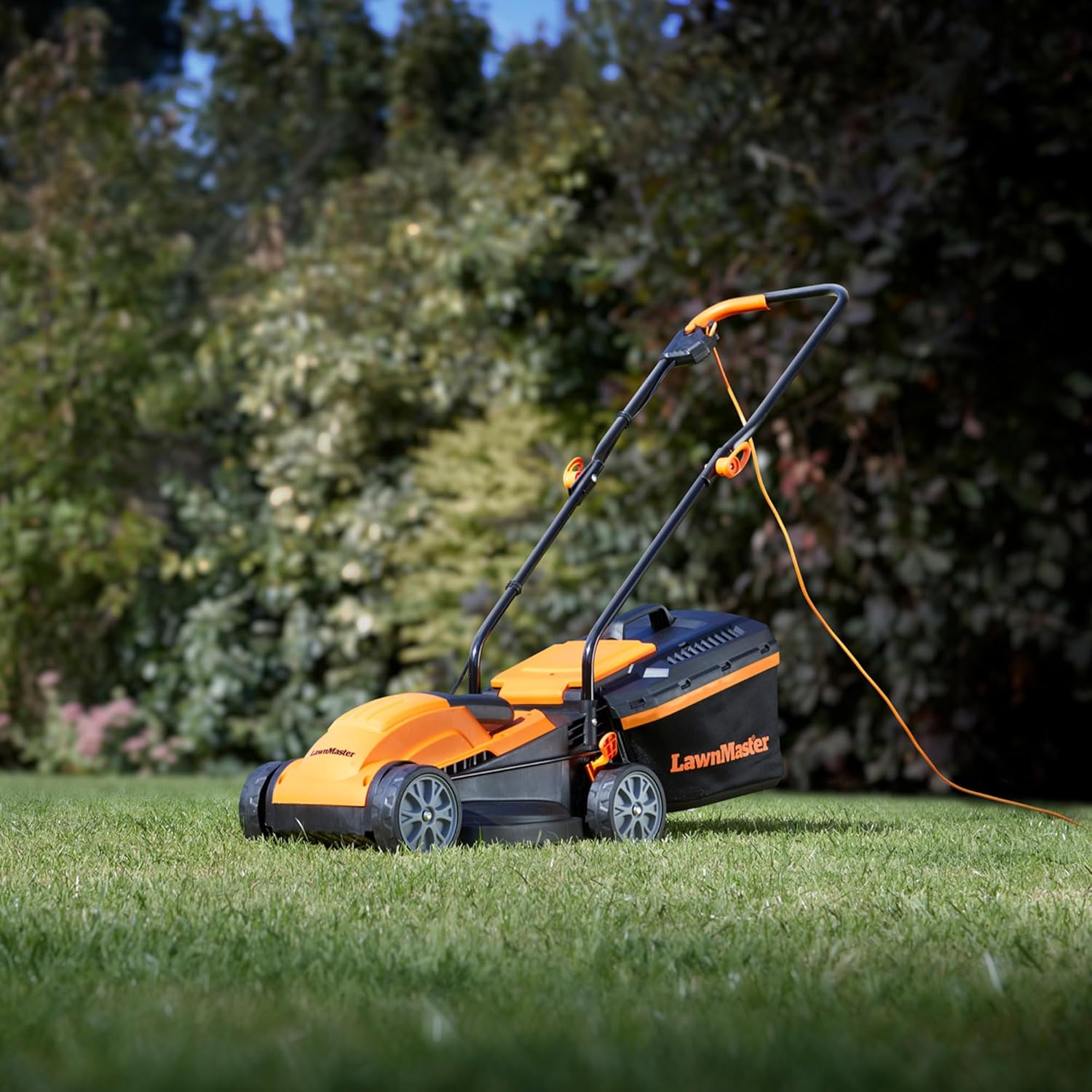 LawnMaster 1200W Electric Lawn Mower with 32cm cutting width, ideal for small lawns. With 5 adjustable cutting heights and rear roller for striped finish, 2 year guarantee